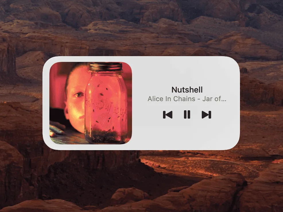 A Menu Bar Controller Widget on the macOS desktop: album art, track title and artist, and previous, pause and next buttons